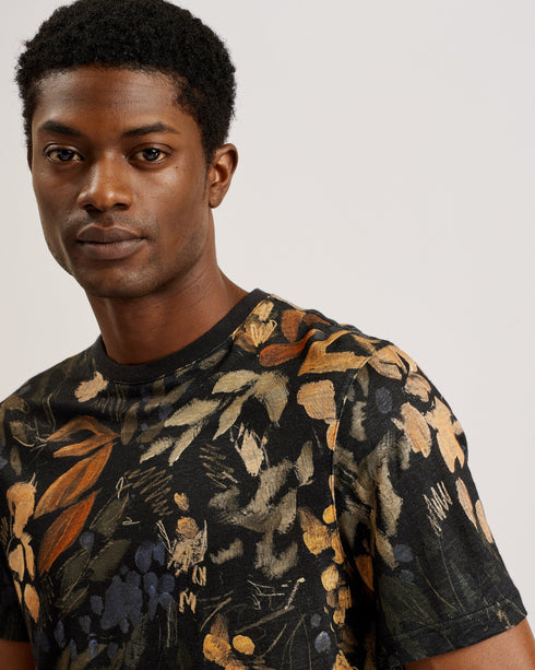 ALLPINE-Tops-New style is blooming with the ALLPINE t-shirt. The all-over floral print creates a vintage feel with its painted style and muted colour palette, which can bring even the simplest of shorts and trousers to life. It's crafted from a light linen for comfortable wear in the warmer months, complete with a ribbed crew neck for added texture. T-shirt All-over painted floral print 100% linen Ribbed crew neck Split hem Regular fit Short sleeves Yahrock is 6'1.5" / 1.87m and wears a Ted size 3- Ted Bake